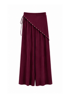 Pantalón tachuelas burdeos